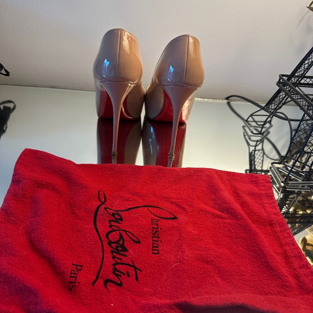 Christian Louboutin Beige Heels with Red Soles